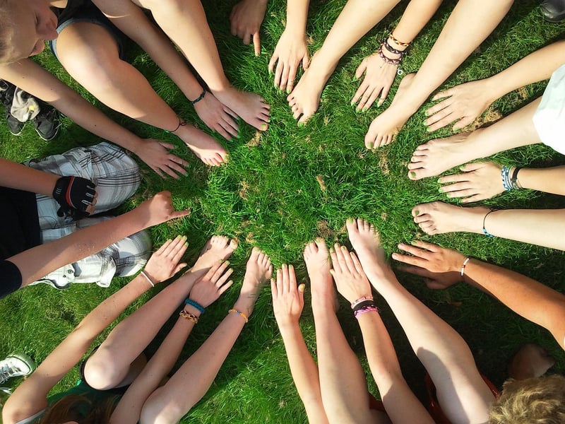 Community holding hands together